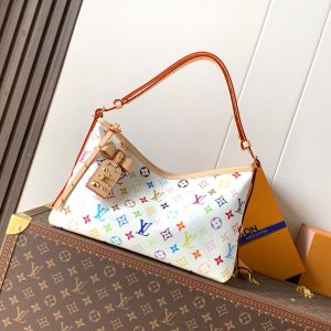 To celebrate the 130th anniversary of the iconic Louis Vuitton Monogram pattern, this Carryall East West reimagines the design in vibrant, colorful tones. Crafted from canvas and adorned with the brand's classic motif, this special edition features a unique leather label inside, paying tribute to this extraordinary milestone.The bag also features a detachable bow and commemorative luggage tag, accented with LV motifs and metal studs for a touch of luxury. 36 x 19 x 0.5 cm (Length x Height x Width) Colorful/White coated canvas with calf leather trim Microfiber lining Gold-tone hardware Zipper closure 1 internal patch pocket 1 internal commemorative leather label 1 detachable bow-shaped charm and anniversary luggage tag Adorned with LV motifs and studs Accommodates 6.7-inch smartphone, earphones, zippered wallet, keys, and lipstick Shoulder strap: non-removable, adjustable